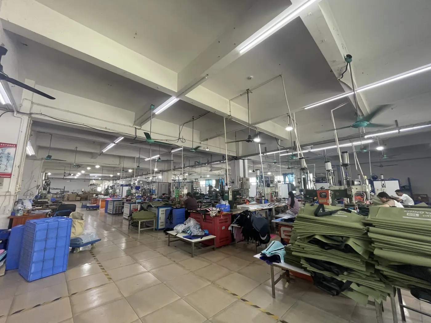 Production floor and material staging at the Outdoorsbloom workshop in Dongguan