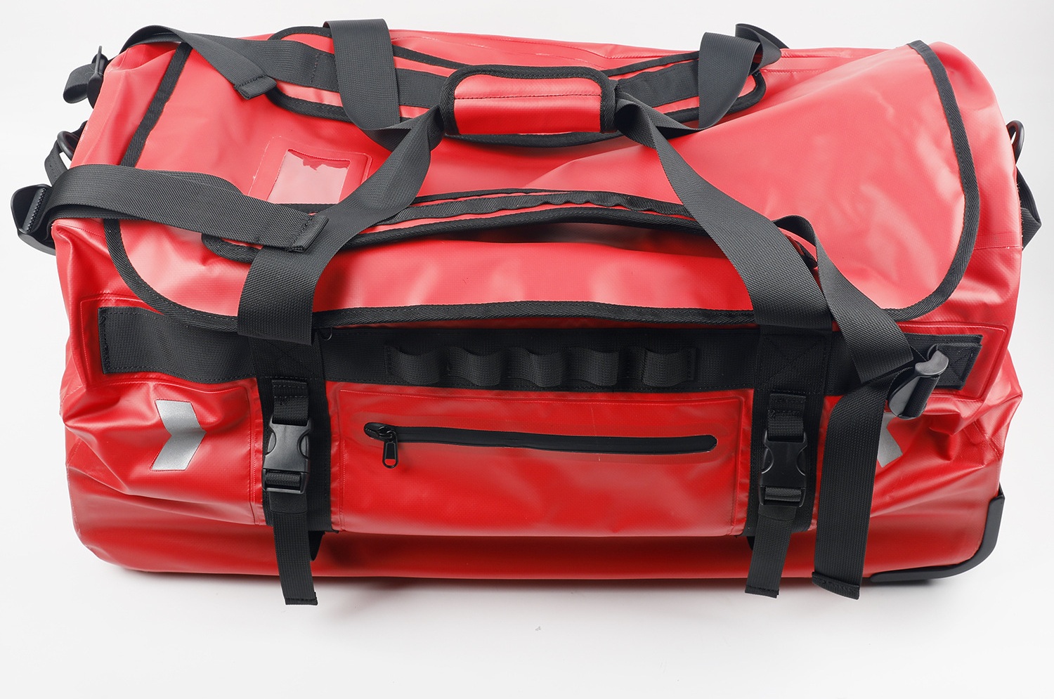 Red 90L wheeled waterproof travel duffel with carry handles
