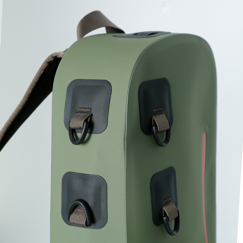 Close-up of external loops and coated shoulder bag fabric