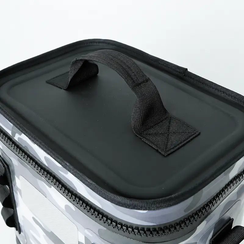 Top lid handle and zipper detail on camouflage cooler